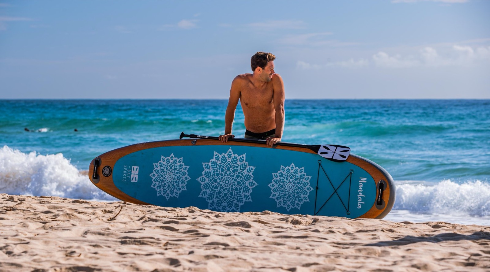 Beginner standing on a paddle board